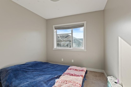 803 Redstone View Ne, Calgary, AB - Indoor Photo Showing Bedroom