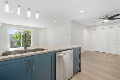 1204-4975 130 Avenue Se, Calgary, AB - Indoor Photo Showing Kitchen With Double Sink