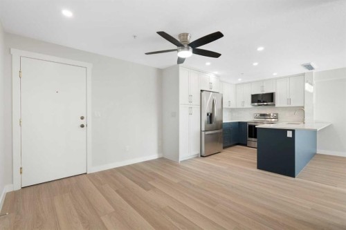 1204-4975 130 Avenue Se, Calgary, AB - Indoor Photo Showing Kitchen With Stainless Steel Kitchen With Upgraded Kitchen