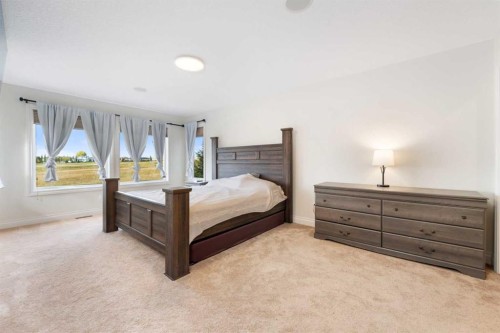 114 Ranch Road, Okotoks, AB - Indoor Photo Showing Bedroom