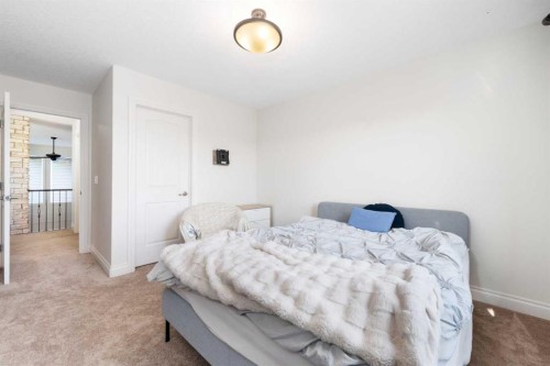 114 Ranch Road, Okotoks, AB - Indoor Photo Showing Bedroom