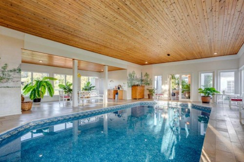 41320 Range Road 232, Rural Lacombe County, AB - Indoor Photo Showing Other Room With In Ground Pool