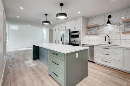 17 Millrise Lane Sw, Calgary, AB - Indoor Photo Showing Kitchen With Upgraded Kitchen