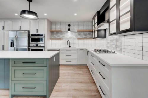 17 Millrise Lane Sw, Calgary, AB - Indoor Photo Showing Kitchen With Upgraded Kitchen