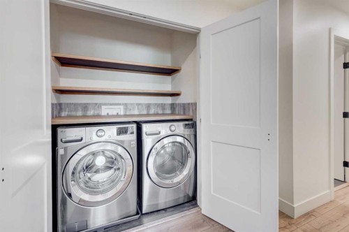 17 Millrise Lane Sw, Calgary, AB - Indoor Photo Showing Laundry Room