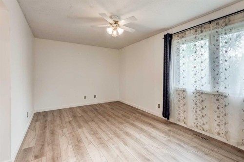 17 Millrise Lane Sw, Calgary, AB - Indoor Photo Showing Other Room