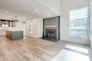 17 Millrise Lane Sw, Calgary, AB  - Indoor Photo Showing Living Room With Fireplace 