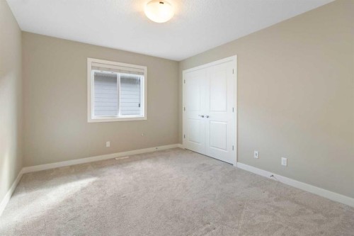 33 Silverado Crest Bay Sw, Calgary, AB - Indoor Photo Showing Other Room