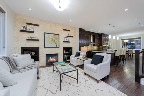 462 23 Avenue Nw, Calgary, AB - Indoor Photo Showing Living Room With Fireplace