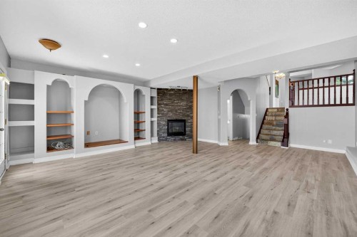 159 Hidden Ranch Circle Nw, Calgary, AB - Indoor With Fireplace