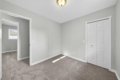 159 Hidden Ranch Circle Nw, Calgary, AB - Indoor Photo Showing Other Room