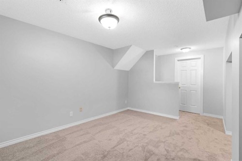 159 Hidden Ranch Circle Nw, Calgary, AB - Indoor Photo Showing Other Room