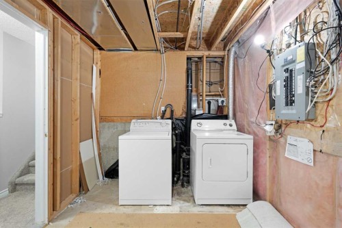 159 Hidden Ranch Circle Nw, Calgary, AB - Indoor Photo Showing Laundry Room