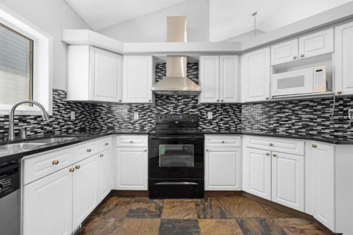 159 Hidden Ranch Circle Nw, Calgary, AB - Indoor Photo Showing Kitchen With Upgraded Kitchen