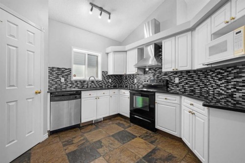 159 Hidden Ranch Circle Nw, Calgary, AB - Indoor Photo Showing Kitchen With Upgraded Kitchen