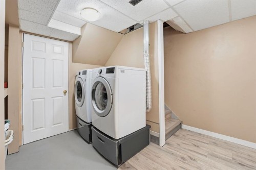 74 Mcrae Street East, Okotoks, AB - Indoor Photo Showing Laundry Room