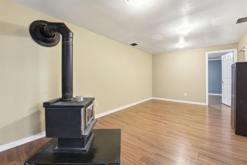 74 Mcrae Street East, Okotoks, AB - Indoor Photo Showing Other Room