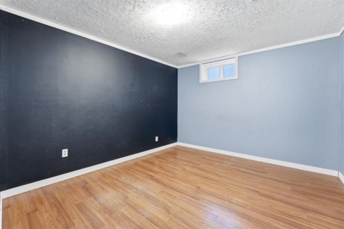 74 Mcrae Street East, Okotoks, AB - Indoor Photo Showing Other Room