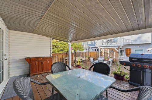 74 Mcrae Street East, Okotoks, AB - Outdoor With Deck Patio Veranda With Exterior