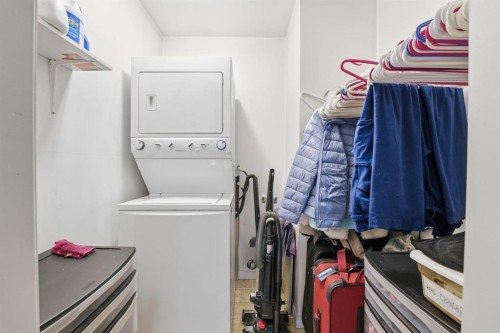 74 Mcrae Street East, Okotoks, AB - Indoor Photo Showing Laundry Room
