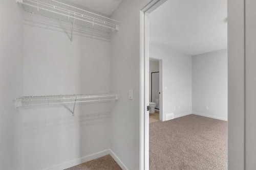 1497 Rangeview Drive Se, Calgary, AB - Indoor With Storage