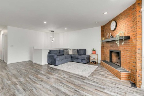 1807 Summerfield Boulevard Se, Airdrie, AB - Indoor Photo Showing Living Room With Fireplace