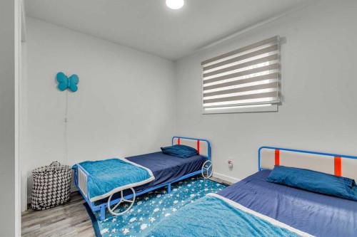 1807 Summerfield Boulevard Se, Airdrie, AB - Indoor Photo Showing Bedroom