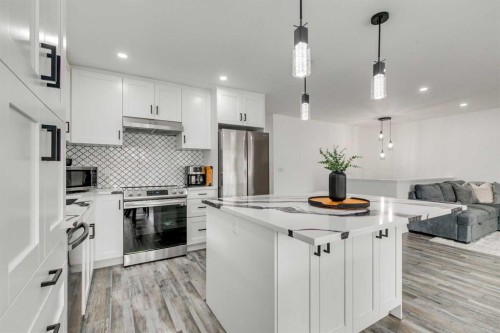 1807 Summerfield Boulevard Se, Airdrie, AB - Indoor Photo Showing Kitchen With Upgraded Kitchen