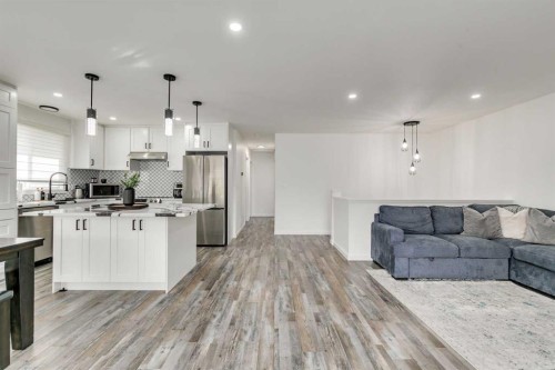 1807 Summerfield Boulevard Se, Airdrie, AB - Indoor Photo Showing Kitchen With Upgraded Kitchen