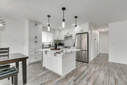 1807 Summerfield Boulevard Se, Airdrie, AB - Indoor Photo Showing Kitchen With Upgraded Kitchen