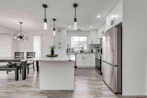 1807 Summerfield Boulevard Se, Airdrie, AB - Indoor Photo Showing Kitchen With Upgraded Kitchen