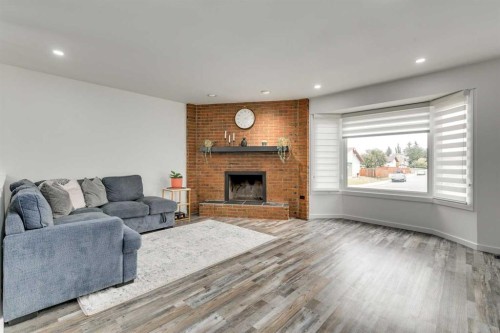 1807 Summerfield Boulevard Se, Airdrie, AB - Indoor Photo Showing Living Room With Fireplace