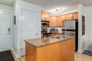 216-2233 34 Avenue Sw, Calgary, AB  - Indoor Photo Showing Kitchen With Double Sink 