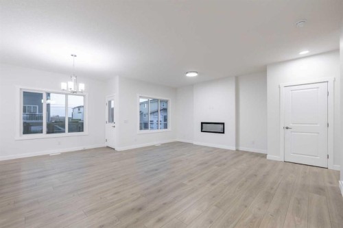 145 Sunstone Way, Balzac, AB - Indoor Photo Showing Other Room