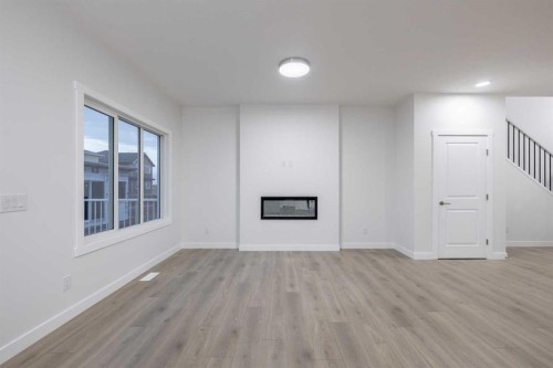 145 Sunstone Way, Balzac, AB - Indoor Photo Showing Other Room