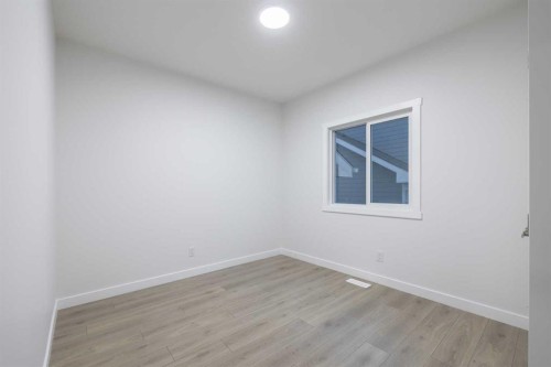 145 Sunstone Way, Balzac, AB - Indoor Photo Showing Other Room