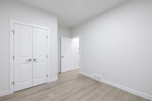 145 Sunstone Way, Balzac, AB - Indoor Photo Showing Other Room