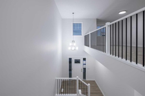 145 Sunstone Way, Balzac, AB - Indoor Photo Showing Other Room