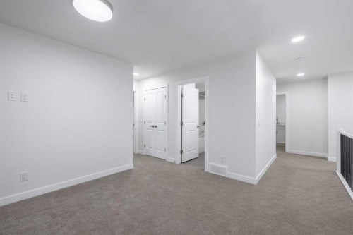 145 Sunstone Way, Balzac, AB - Indoor Photo Showing Other Room