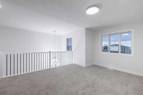 145 Sunstone Way, Balzac, AB - Indoor Photo Showing Other Room