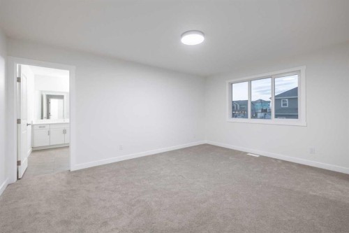 145 Sunstone Way, Balzac, AB - Indoor Photo Showing Other Room