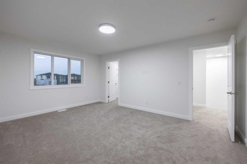 145 Sunstone Way, Balzac, AB - Indoor Photo Showing Other Room