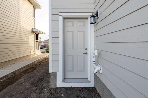 145 Sunstone Way, Balzac, AB - Outdoor With Exterior