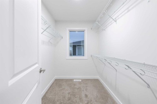 145 Sunstone Way, Balzac, AB - Indoor With Storage