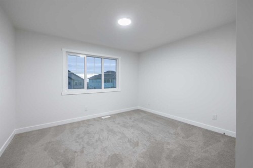 145 Sunstone Way, Balzac, AB - Indoor Photo Showing Other Room