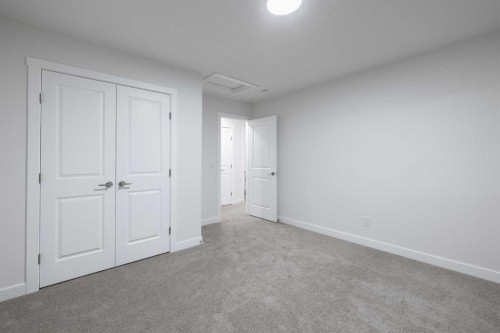 145 Sunstone Way, Balzac, AB - Indoor Photo Showing Other Room