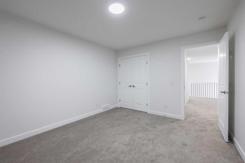 145 Sunstone Way, Balzac, AB - Indoor Photo Showing Other Room