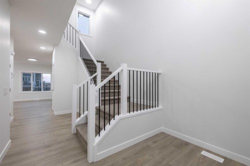 145 Sunstone Way, Balzac, AB - Indoor Photo Showing Other Room