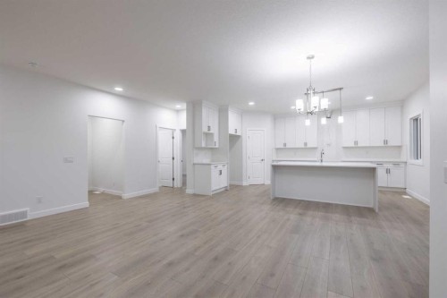 145 Sunstone Way, Balzac, AB - Indoor Photo Showing Kitchen