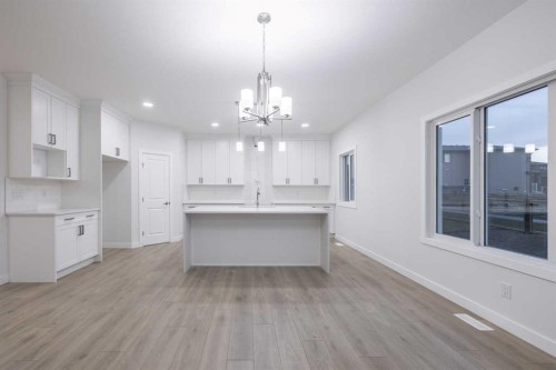 145 Sunstone Way, Balzac, AB - Indoor Photo Showing Kitchen